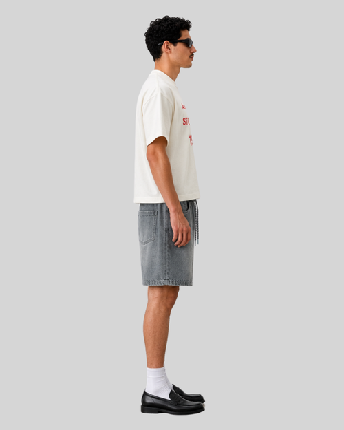 Deconstructed and spliced washed denim shorts for men
