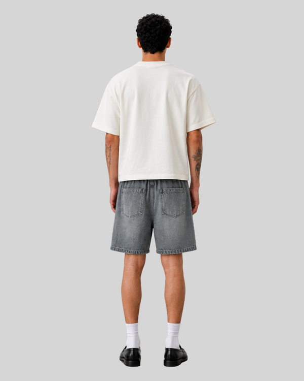 Deconstructed and spliced washed denim shorts for men